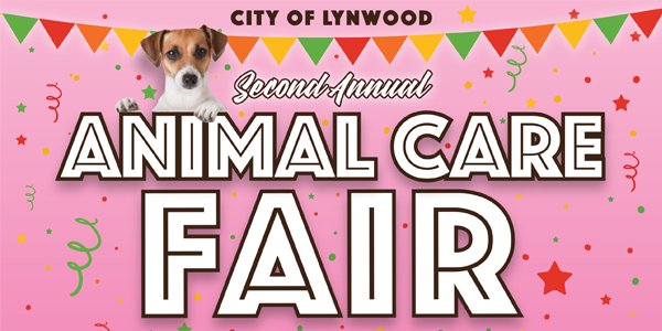 City of Lynwood Second Annual Animal Care Fair text. Pink background with confetti and colored banner. Brown and white dog perched on top of text
